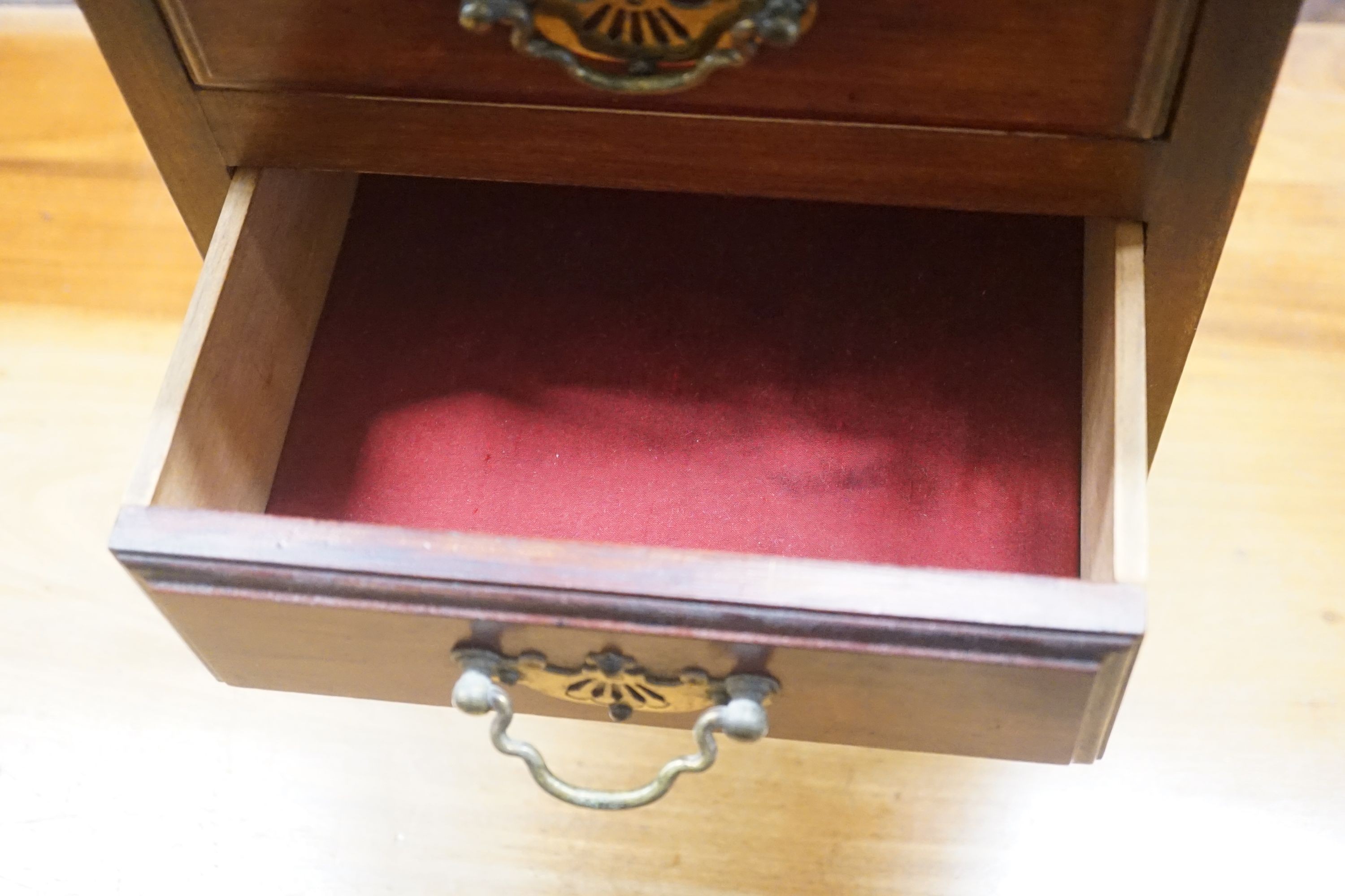 A late Victorian mahogany miniature four drawer chest, width 28cm depth 28cm height 42cm